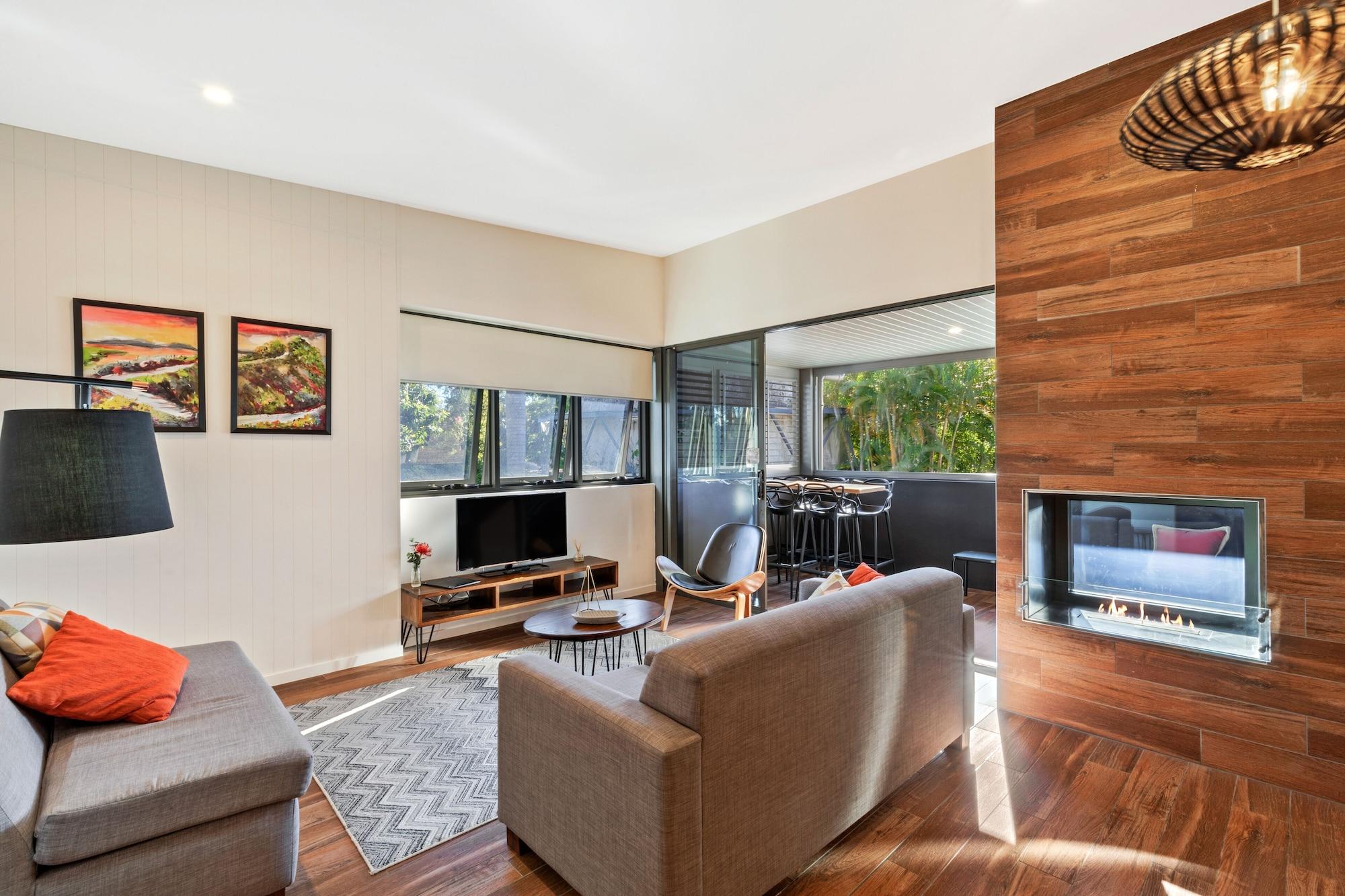 Altitude On Montville Exteriör bild A living room with a fireplace