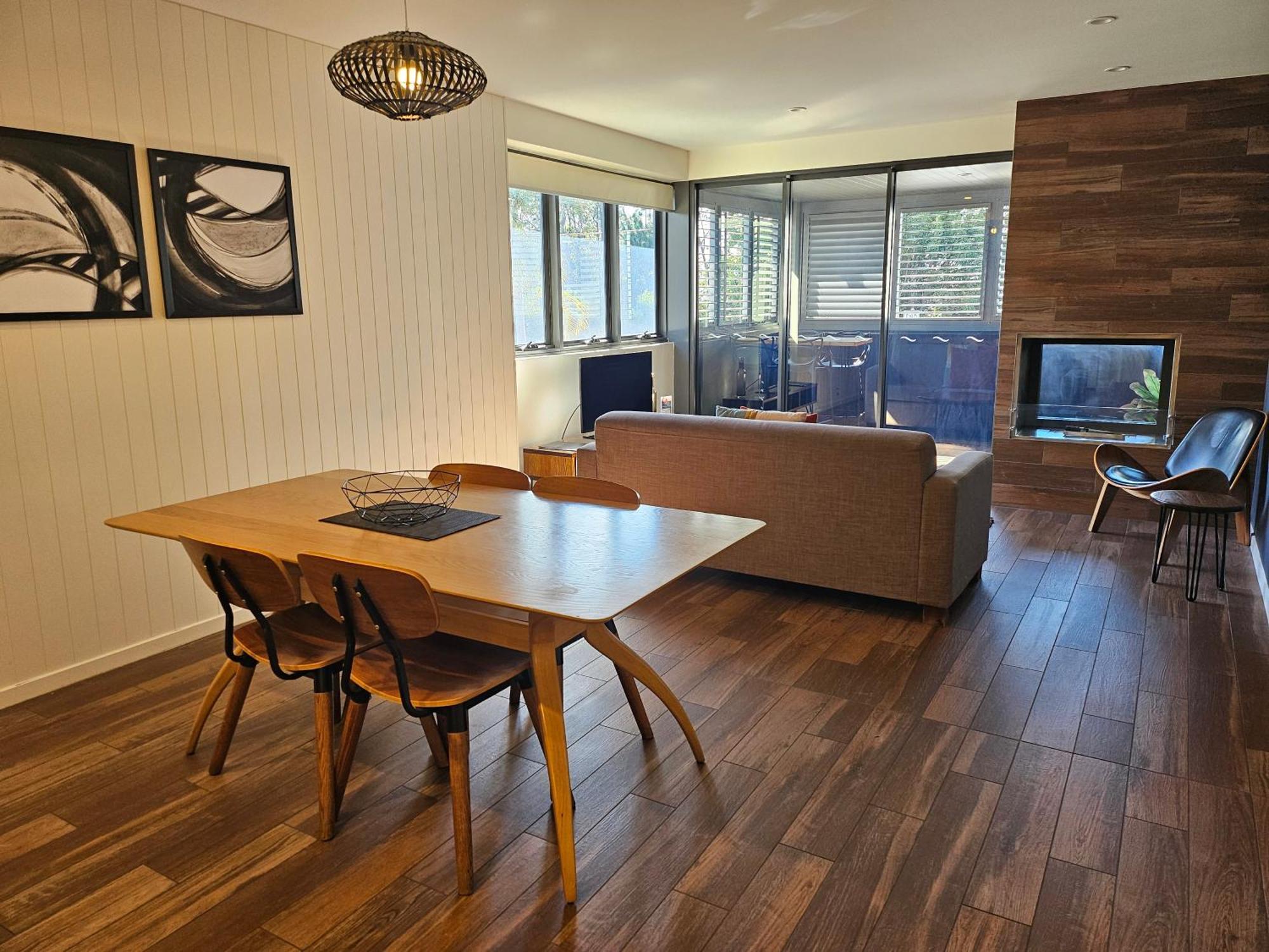 Altitude On Montville Exteriör bild A living room with a fireplace